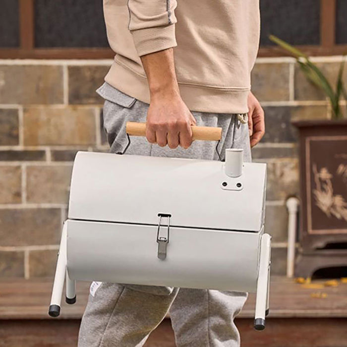 Portable Charcoal BBQ Grill with Foldable Legs and Dual Air Vents